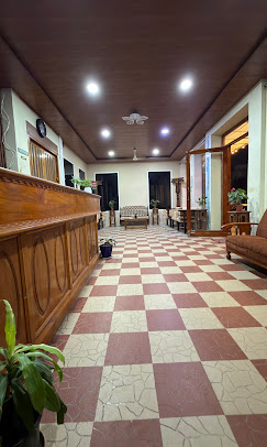 Hotel corridor with checkered flooring